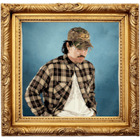 a man with a mustache in a gold frame